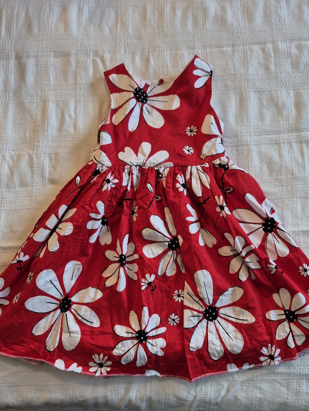 Mayoral girls size 6 red dress with white & black flowers, bottom hem down VGUC
